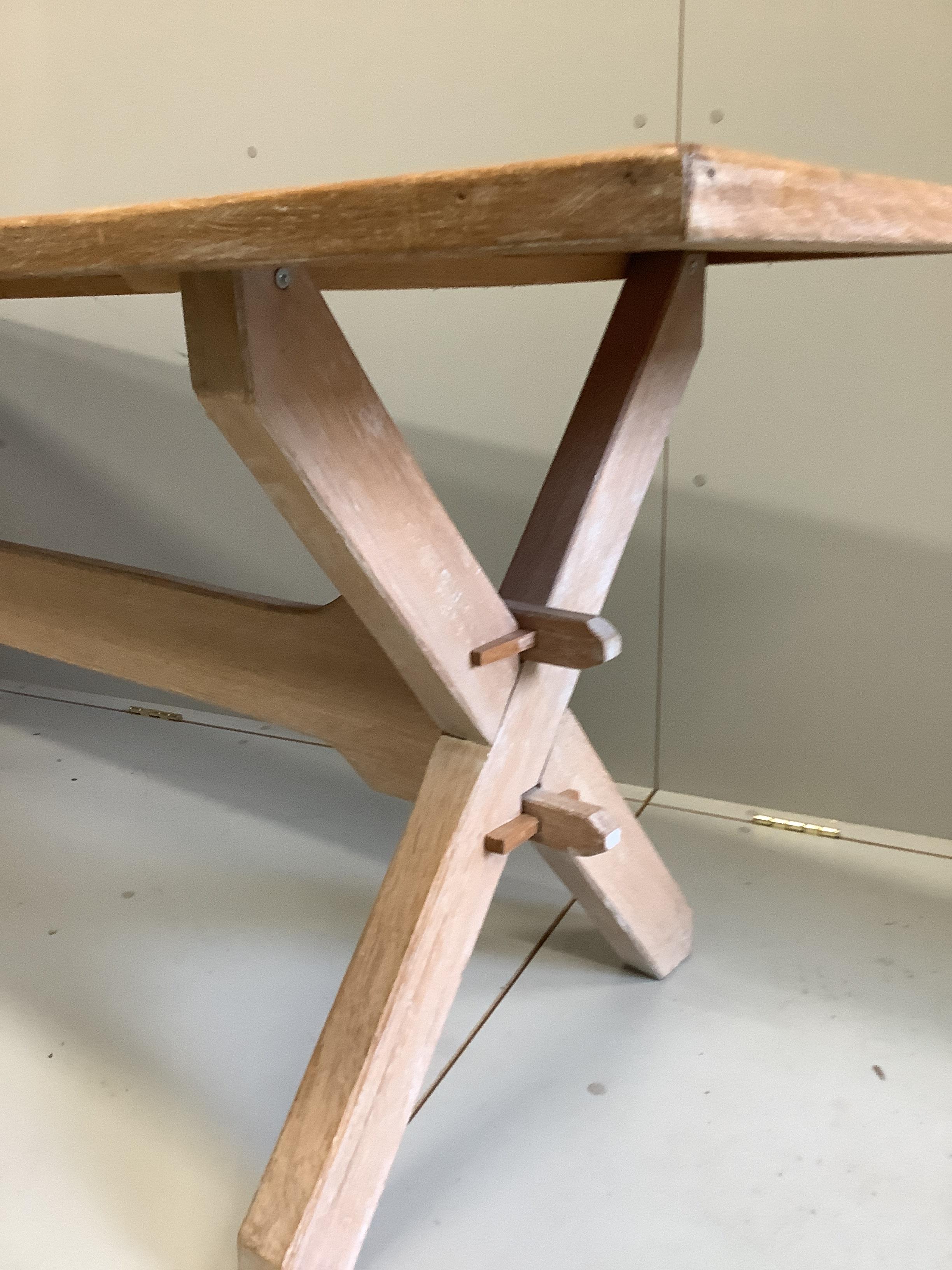 An 18th century style rectangular bleached oak tavern table, length 205cm, width 67cm, height 74cm